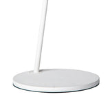 A close-up of the Capuccina LED Floor Lamp 8.5W 3000K in White shows its round base and slender pole, highlighting the lamp’s modern design against a plain white background.