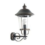 Casement cast aluminium outdoor wall lantern in a dark bronze finish, with domed roof, clear glazed panels, exposed bulb, and scrolled wall bracket on a plain white background.