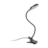 Casetto Clamp Lamp in black with a round LED panel head, flexible gooseneck arm, and spring clip base, shown on a plain white background.