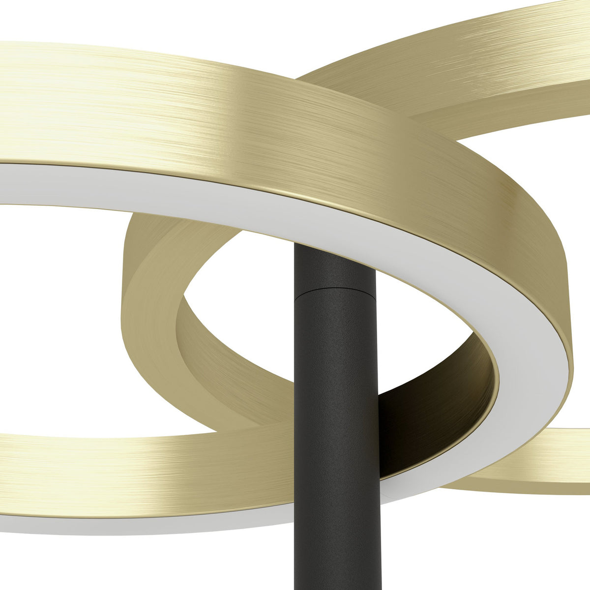 Close-up of the Castelpoto 1 LED floor lamp showing intersecting brushed brass rings with white diffuser edges around a slim black stem, set against a plain white background.