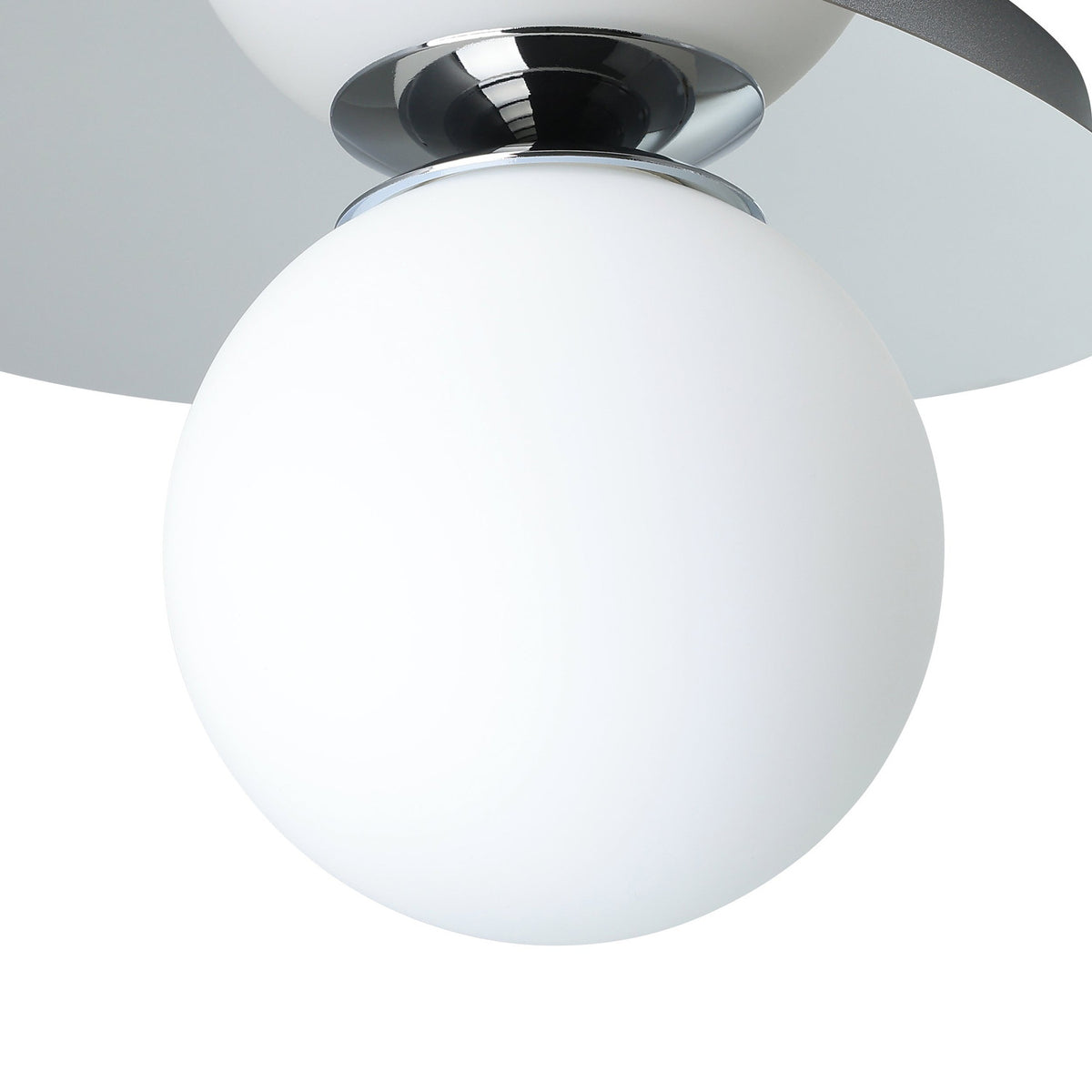 Castrovido bathroom wall light in chrome, close-up of the spherical matt opal glass shade on a chrome backplate and holder.