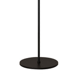 A close-up of the Cellar LED Floor Lamp 5W 4000K - Black shows its circular metal base and sleek vertical pole, highlighting the minimalist elegance of this modern floor lamp against a white background.
