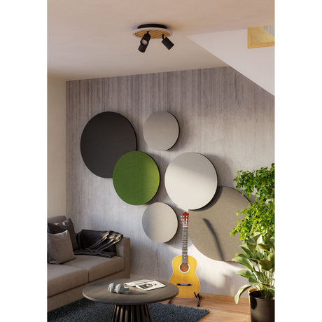 Cembrano LED 3 Light Flush Ceiling Light with black spot heads on a round natural wood slat panel, framed in black and white, shown mounted above a living room seating area.