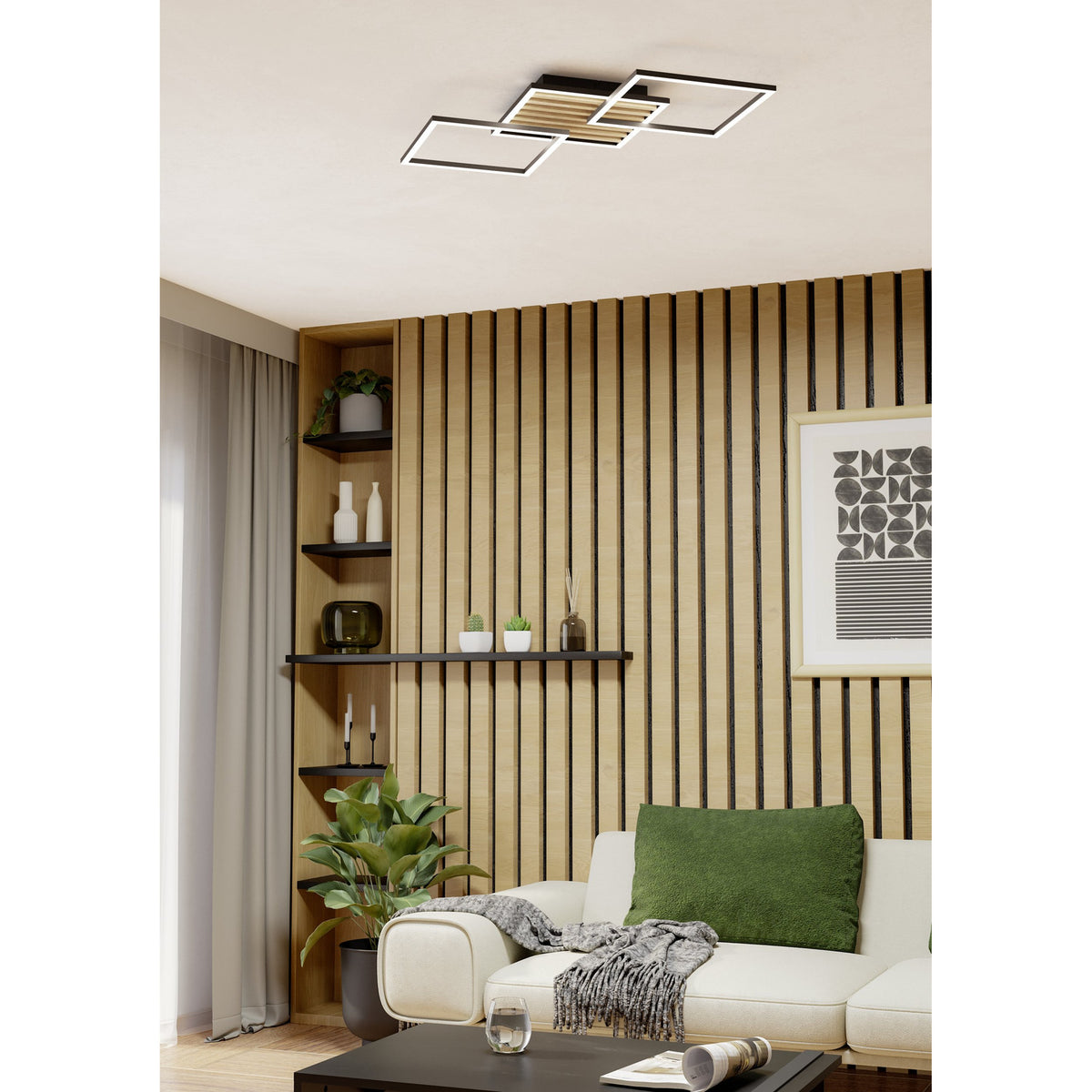 Cembrano LED flush ceiling light, 92.5cm, with overlapping black square frames and a natural wood slat panel, shown mounted on a living room ceiling above a wood-slatted feature wall.