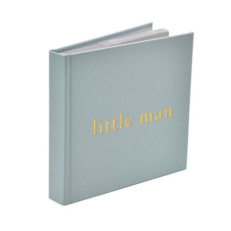 Square blue linen photo album with "little man" in gold lettering on the cover, woven texture visible, shown at an angle on a white background.