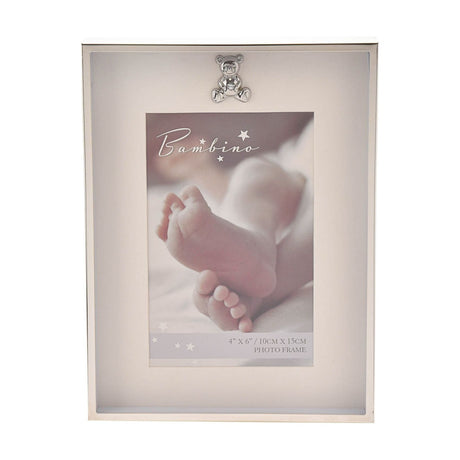 Rectangular silverplated photo frame with a thin silver border, cream mount, and small teddy bear detail above a 6 x 4in portrait photo, shown on a white background.