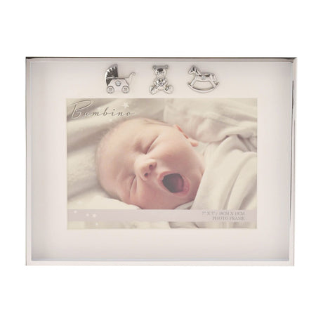 Silverplated rectangular photo frame with thin polished border, white mount, and three silver charms—pram, teddy bear, and rocking horse—for a 7 x 5in photo.