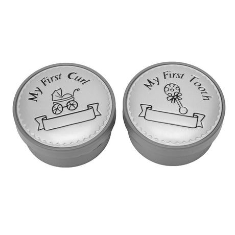 Round silver-plated scalloped keepsake boxes, one embossed My First Curl above a pram, the other My First Tooth above a rattle, each with a blank banner and grey base.
