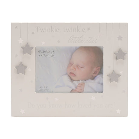 White MDF photo frame for a 5 x 3.5in photo, featuring "Twinkle, twinkle, little star" text and raised silver 3D stars hanging along both sides.
