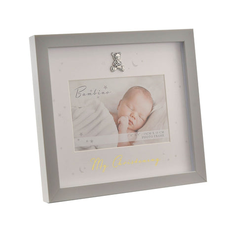 Grey MDF "My Christening" photo frame with a silver teddy bear charm, gold script text, and star and moon details on the off-white mount, holding a sleeping baby photo.