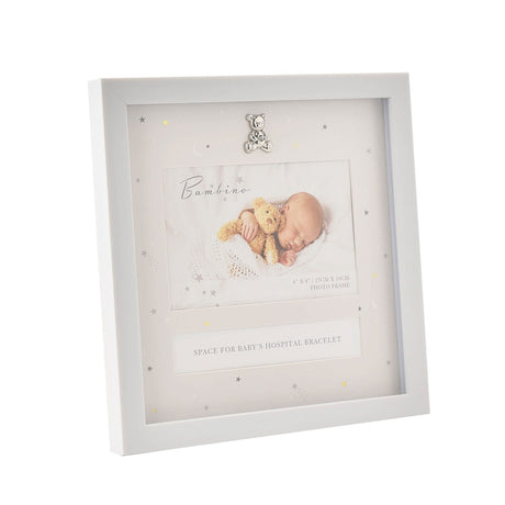 White square MDF keepsake box frame with a silver teddy bear charm, holding a 6x4in baby photo and a label for baby's hospital bracelet, on a plain background.