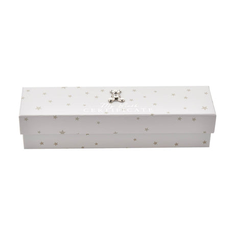 Rectangular white paperwrap keepsake box with scattered star print, silver-coloured teddy bear on the lid, and "My Birth CERTIFICATE" in foiled lettering, on a plain background.
