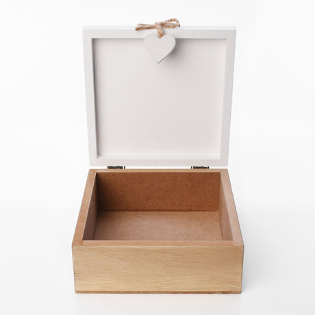 Square MDF keepsake box with open white lid and natural wood-effect base, a small white heart with twine bow hanging from the lid, shown empty on a plain background.