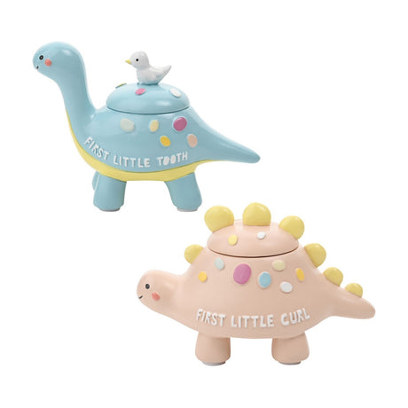 Resin dinosaur keepsake box set: a pale blue long-necked First Little Tooth box with bird topper, and a pink stegosaurus First Little Curl box with yellow back plates.