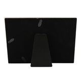 Back view of the Elephant and Hearts ceramic photo frame showing a black velvet backing, foldout stand, and hanging hooks, on a white background.
