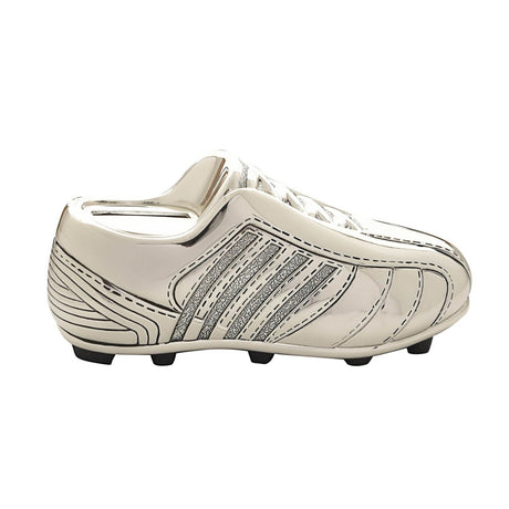 Silverplated metal football boot money box with raised laces, stitched detailing, and textured side stripes, studded sole, shown on a plain white background.