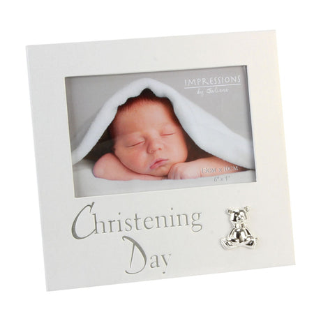 White pearlised MDF photo frame for a 6x4in landscape photo, with silver "Christening Day" lettering and a small teddy bear accent below the opening.