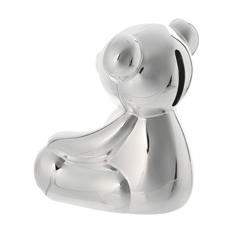 Sitting Teddy Bear Silverplated Metal Money Box with polished silver finish, rounded ears, raised eyes and a coin slot at the back of the head, shown on a plain white background.