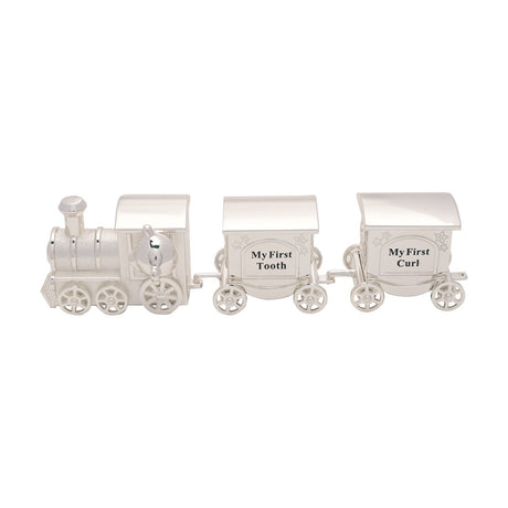 Silverplated train keepsake box set with a steam engine and teddy bear, plus two carriages labelled "My First Tooth" and "My First Curl", on spoked wheels against a white background.