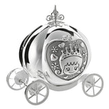 Silverplated pumpkin coach money box with four spoked wheels and a scrolled finial, featuring a textured front panel of a crowned princess framed by hearts and flowers, on a white background.