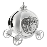 Silverplated metal money box shaped as a pumpkin coach with spoked wheels and a scrolled finial, featuring a textured front panel with a crowned princess design, on a white background.