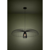 Champerico Pendant Light 98.5cm in black steel, wide open wire-cage canopy over a slatted inner shade with a single E27 bulb, hung from a black ceiling rose in a dimly lit room.