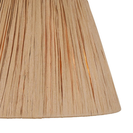 Close-up of the Endon Chartshaw 24cm tapered lamp shade showing its hand-wrapped natural raffia weave in a warm earthy tone.