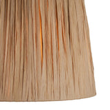 Close-up of the Endon Chartshaw 32cm tapered lamp shade in natural raffia, showing the hand-wrapped vertical weave and warm earthy tone.