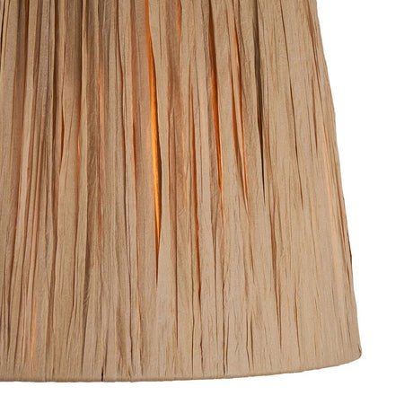 Close-up of the Endon Chartshaw 32cm tapered lamp shade in natural raffia, showing the hand-wrapped vertical weave and warm earthy tone.