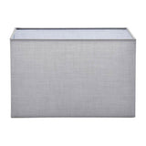 Chartstead Rectangular 27cm Tapered Lamp Shade in grey cotton fabric with a rolled edge and white interior, shown on a plain background.