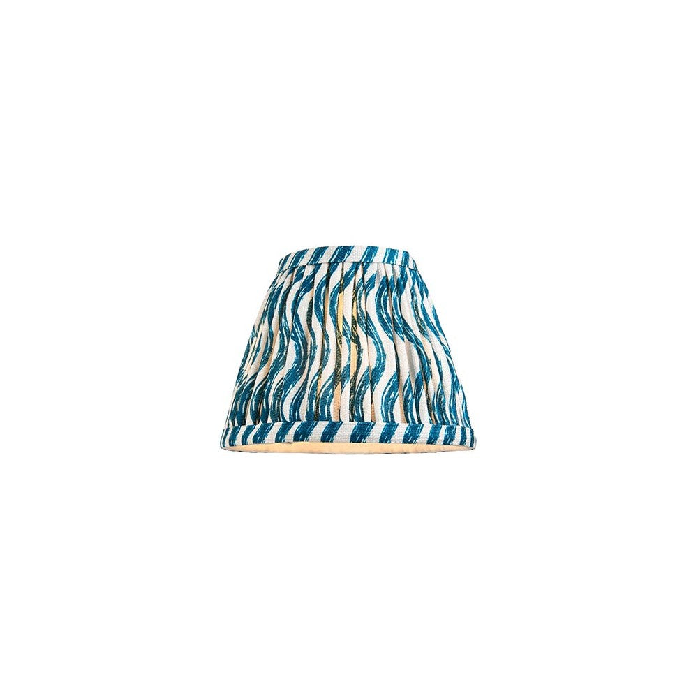 Endon Chartwood 16cm tapered lamp shade in marlin blue, pleated faux linen with a rippled blue and white print and taped edges, on a white background.