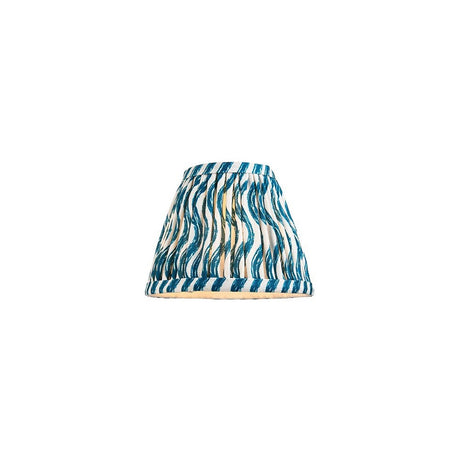 Endon Chartwood 16cm tapered lamp shade in marlin blue, pleated faux linen with a rippled blue and white print and taped edges, on a white background.