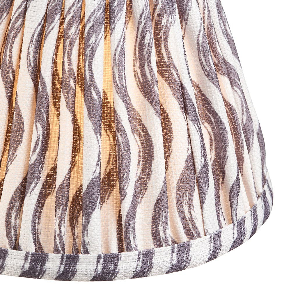 Close-up of Endon Chartwood 16cm tapered lamp shade in pearl grey, showing pleated faux linen with a soft ripple print and taped edge trim.