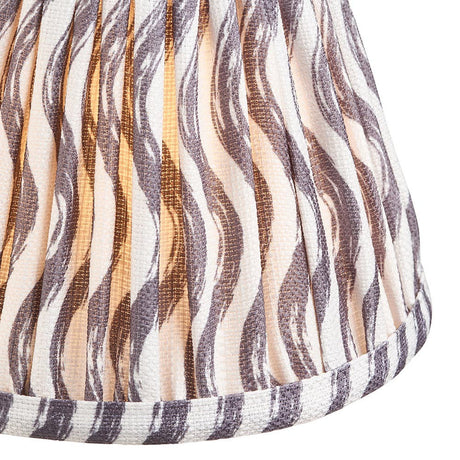 Close-up of Endon Chartwood 16cm tapered lamp shade in pearl grey, showing pleated faux linen with a soft ripple print and taped edge trim.