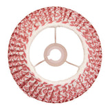 Chartwood 25cm tapered lamp shade in coral pink faux linen with pleated ripple pattern and white taped edges, shown from above on a plain white background.