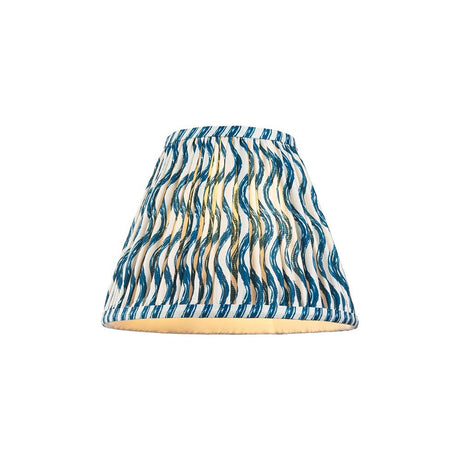Endon Chartwood 25cm tapered lamp shade in marlin blue and white pleated faux linen with a ripple print and taped edges, on a plain background.