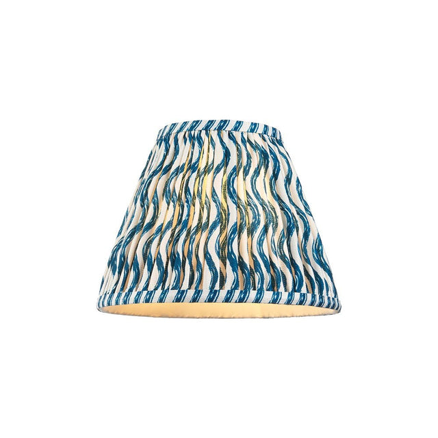 Endon Chartwood 25cm tapered lamp shade in marlin blue and white pleated faux linen with a ripple print and taped edges, on a plain background.