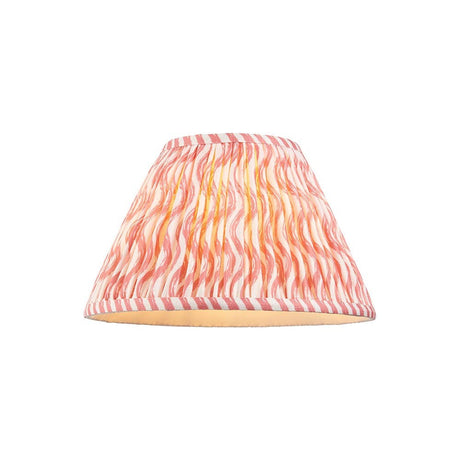 Endon Chartwood 30cm tapered lamp shade in pleated coral pink and white faux linen with a rippled print and taped edges, on a plain background.