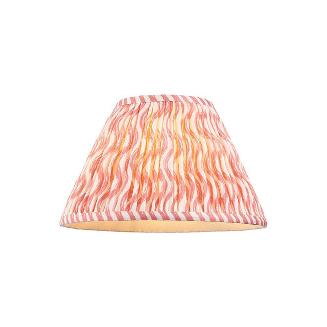Endon Chartwood 30cm tapered lamp shade in pleated coral pink and white faux linen with a rippled print and taped edges, on a plain background.