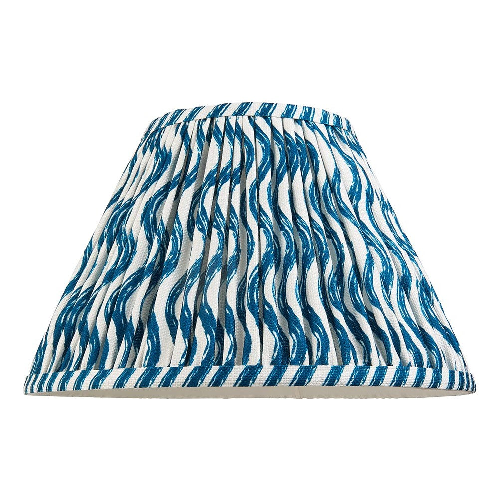 Endon Chartwood 30cm tapered lamp shade in pleated faux linen with a marlin blue and white ripple print and taped edges, on a plain white background.