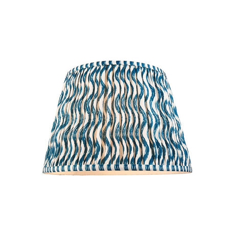Endon Chartwood 35cm tapered lamp shade in marlin blue and white pleated faux linen with a rippled wave print, shown on a plain white background.