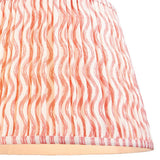 Endon Chartwood 40cm tapered lamp shade in coral pink and white pleated faux linen with a rippled wave print and taped edge trim.