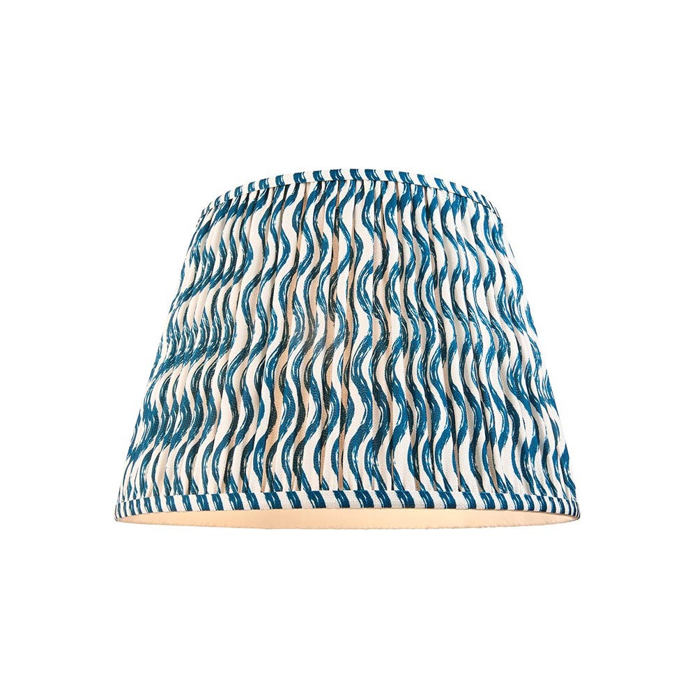 Endon Chartwood 40cm tapered lamp shade in marlin blue and white pleated faux linen with a rippled print and taped edges, on a plain background.