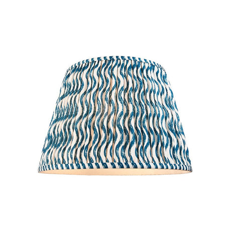 Endon Chartwood 40cm tapered lamp shade in marlin blue and white pleated faux linen with a rippled print and taped edges, on a plain background.