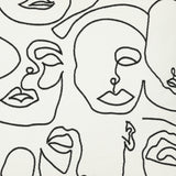 Chevery cushion cover in cotton, cream ground with embroidered black line-art faces in a continuous single-line design, raised thread texture.