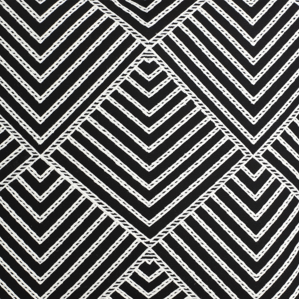 Chevery Cushion in black and white showing a close-up of the stitched chevron and diamond pattern texture on the square cover.
