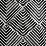 Chevery Cushion in black and white showing a close-up of the stitched chevron and diamond pattern texture on the square cover.