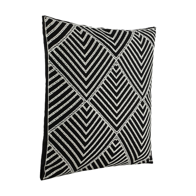Chevery Cushion in black and white, a square 45cm cushion with a stitched geometric chevron and diamond pattern, shown angled on a plain white background.