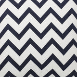 Chevery Cushion cover close-up showing a bold navy blue and white chevron zigzag pattern printed on textured 100% cotton fabric.