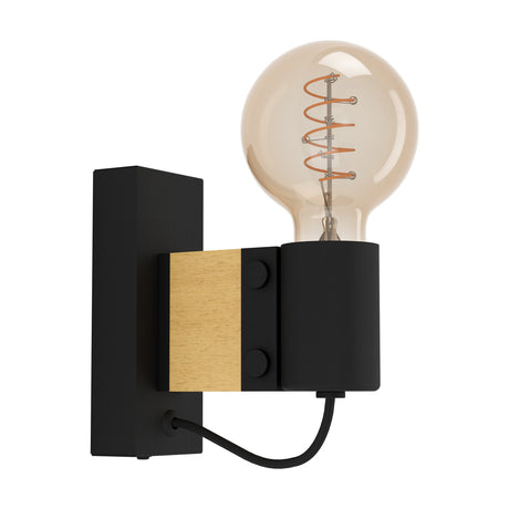 Cirbette wall light with a slim black steel backplate and light brown wood arm, black cylindrical holder with upright bulb and braided flex detail, shown on a white background.